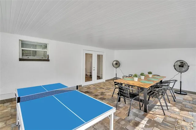 a room with furniture and wooden floor