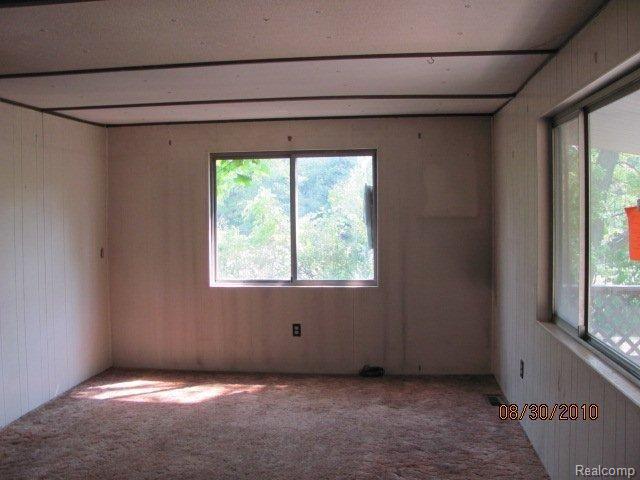 2431 West Rattalee Lake Road Holly, MI 48442 - Photo 2 of 8 living
