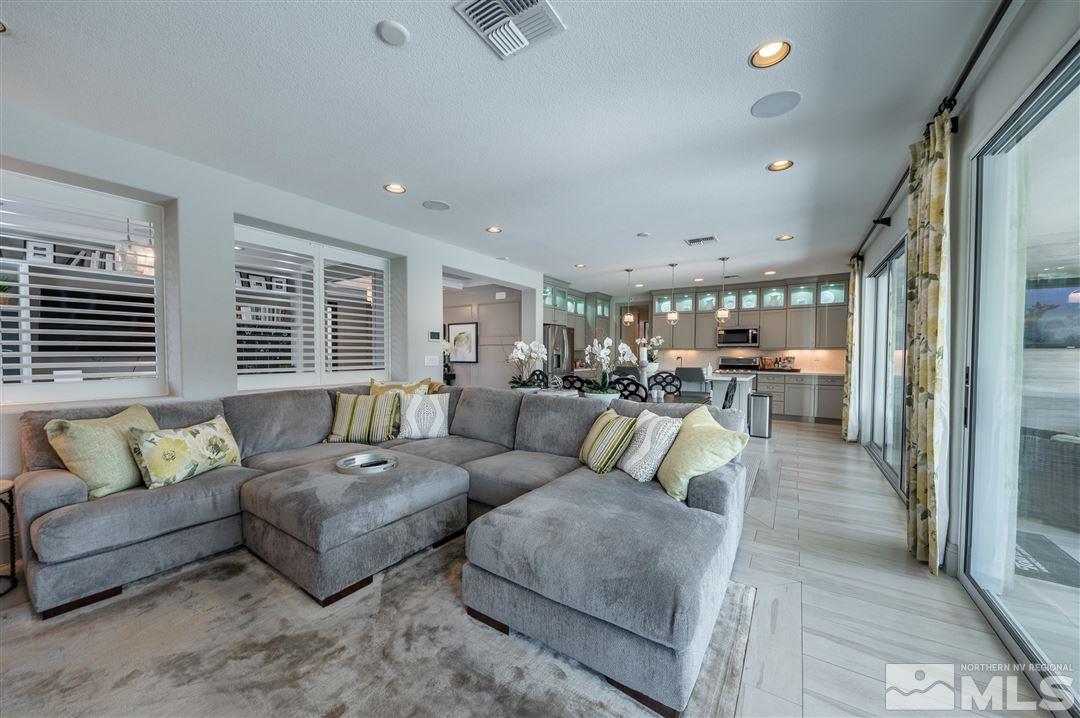 9920 Hafflinger Lane Reno, NV 89521 - Photo 8 of 36 a living room with furniture and a large window