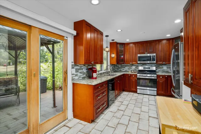 $469,900 | 1002 Bruce Drive, Elgin, IL 60120