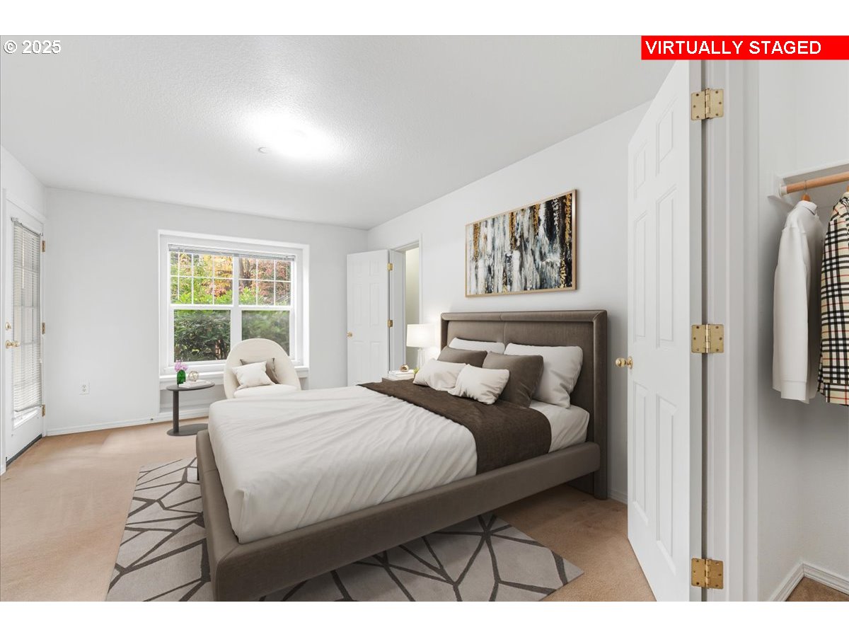 30424 Southwest Ruth Street, Unit 84 Wilsonville, OR 97070 - Photo 19 of 48 a bedroom with a bed a window and potted plant