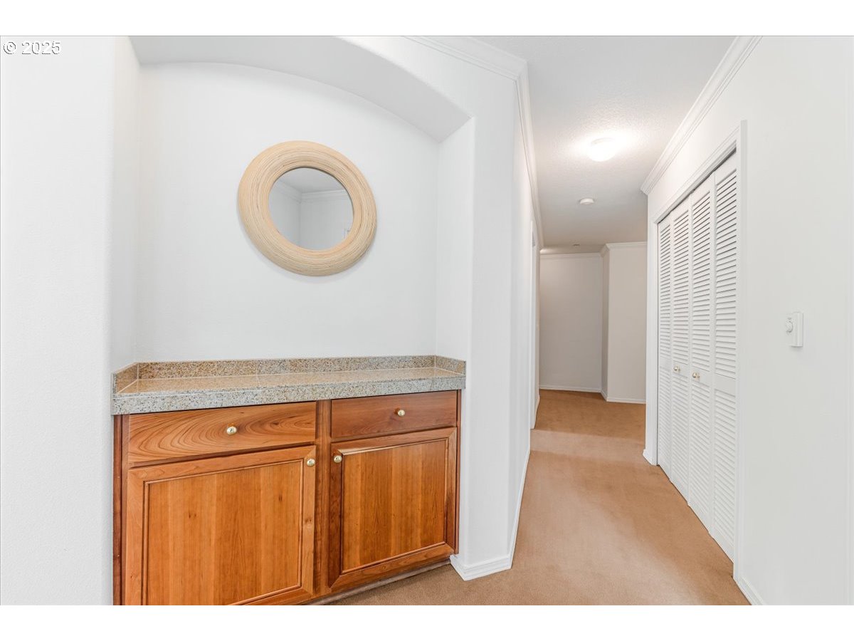 30424 Southwest Ruth Street, Unit 84 Wilsonville, OR 97070 - Photo 26 of 48 a view of a kitchen with wooden floor