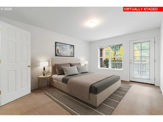 a bedroom with a large bed and a view of bedroom