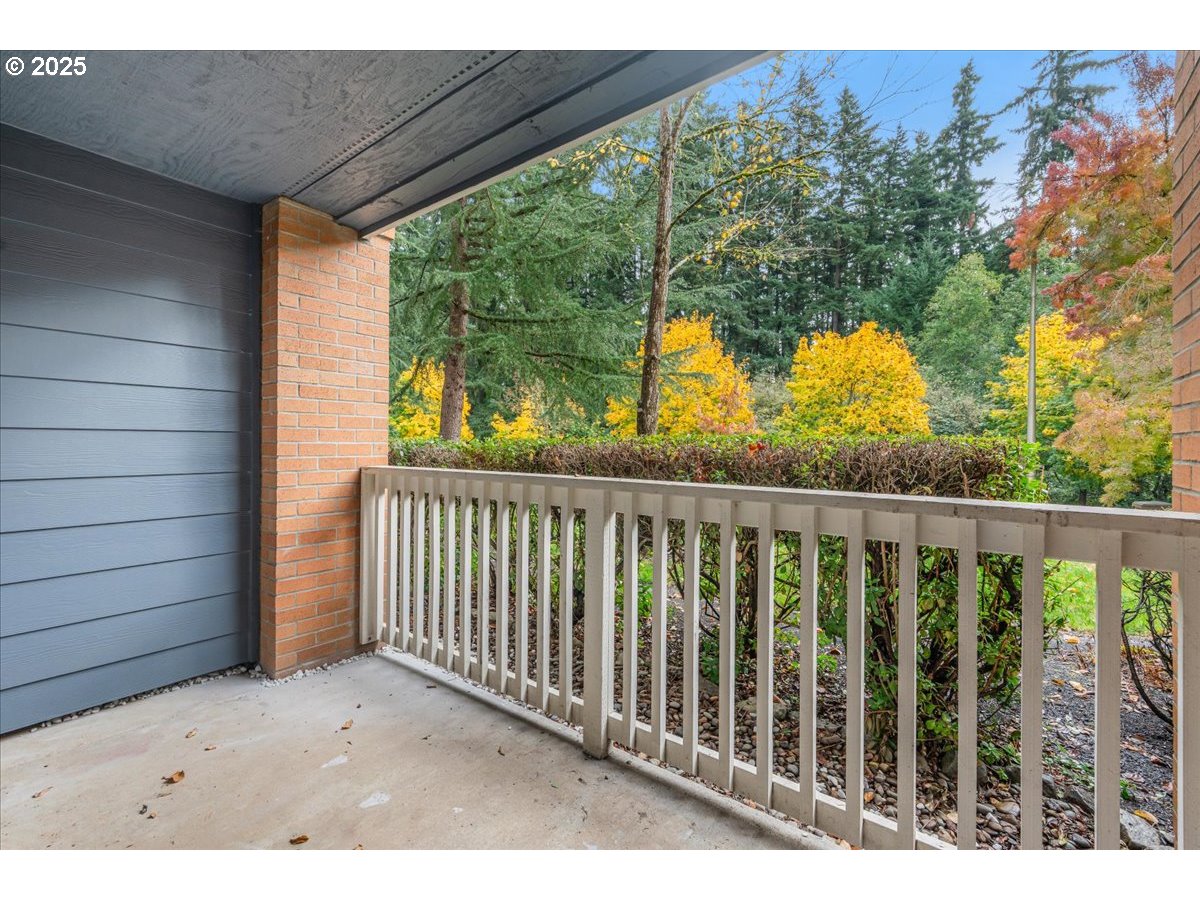 30424 Southwest Ruth Street, Unit 84 Wilsonville, OR 97070 - Photo 33 of 48 a view of balcony with wooden floor