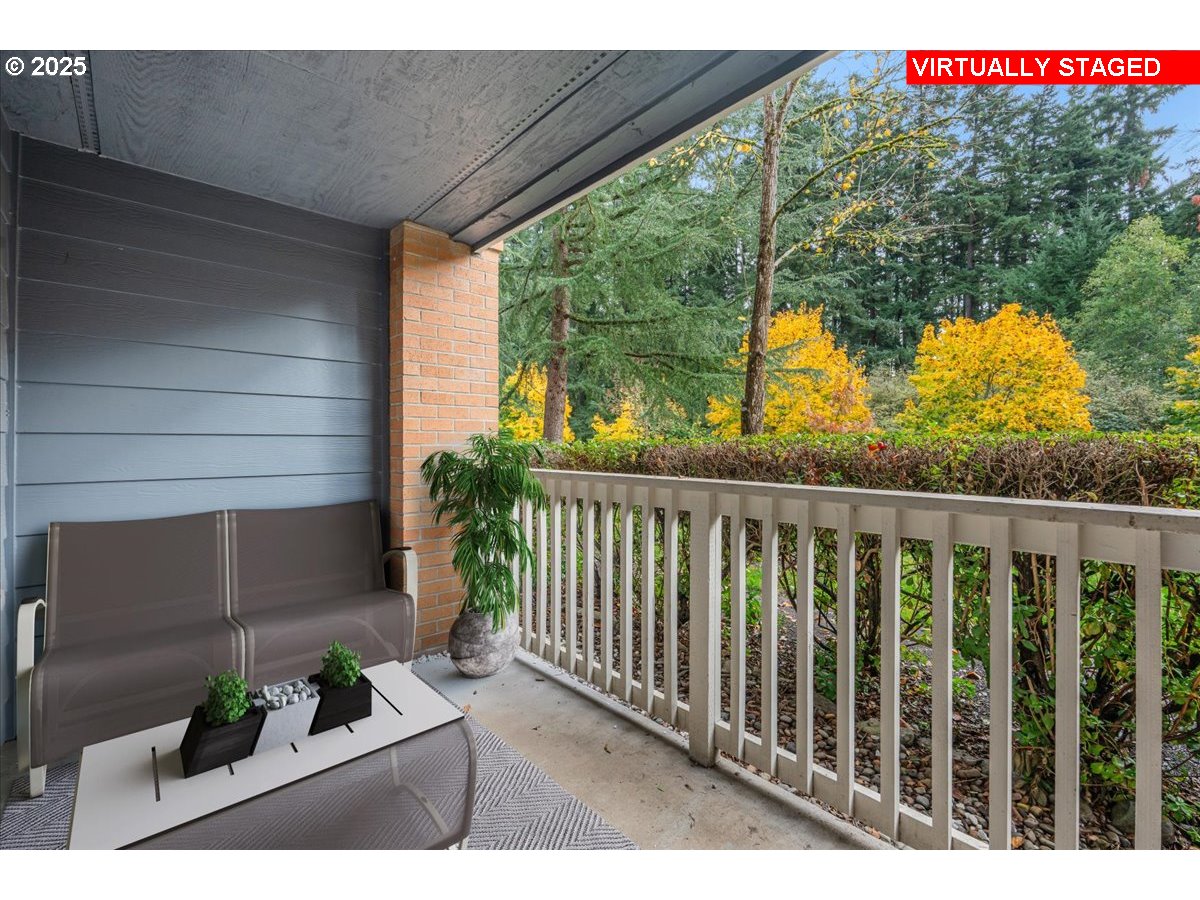 30424 Southwest Ruth Street, Unit 84 Wilsonville, OR 97070 - Photo 34 of 48 a view of balcony with furniture