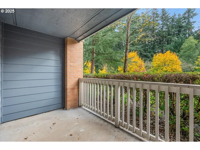 a view of balcony with wooden floor