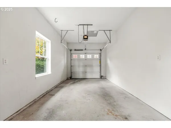 a view of a windows and an entryway in a room