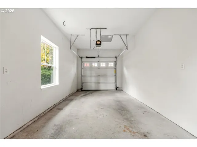 a view of a windows and an entryway in a room