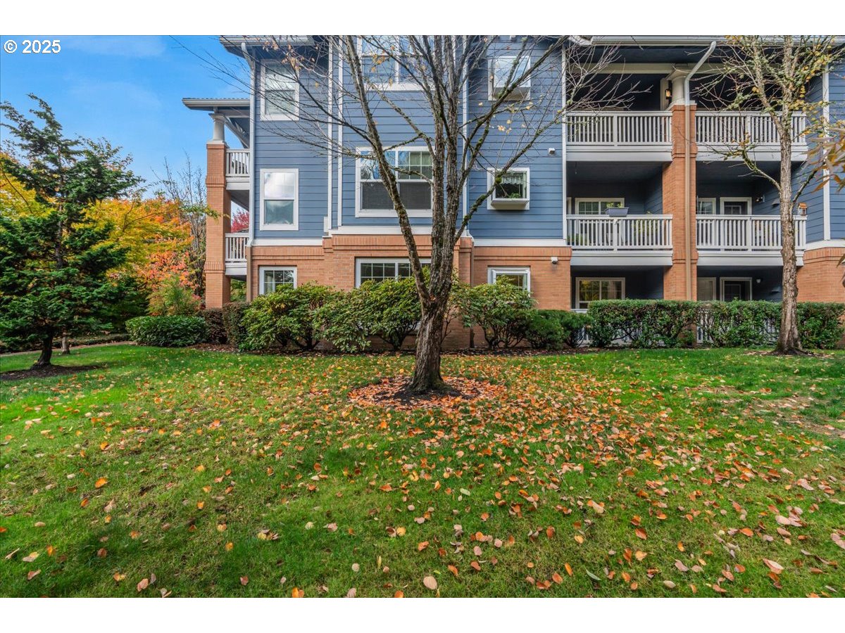 30424 Southwest Ruth Street, Unit 84 Wilsonville, OR 97070 - Photo 39 of 48 a front view of a house with a yard