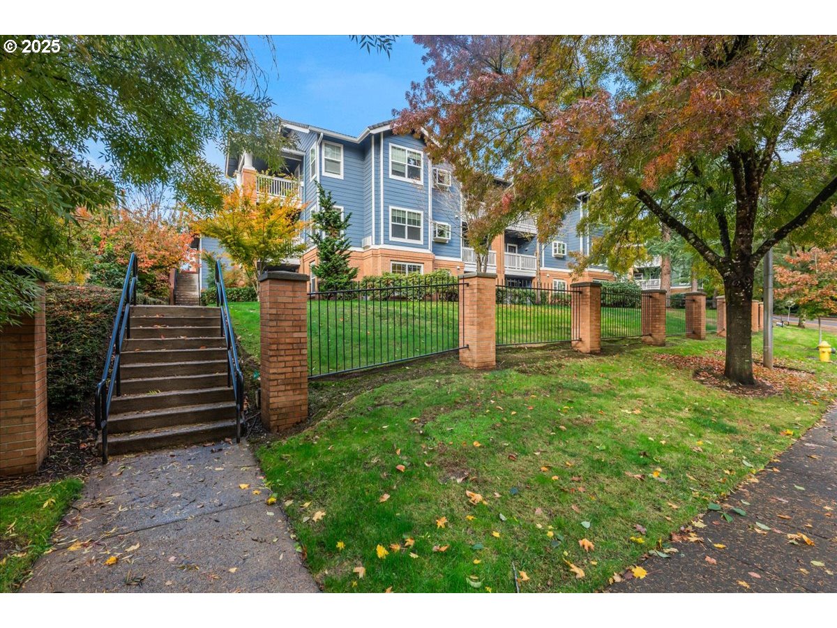 30424 Southwest Ruth Street, Unit 84 Wilsonville, OR 97070 - Photo 41 of 48 a view of a house with a backyard