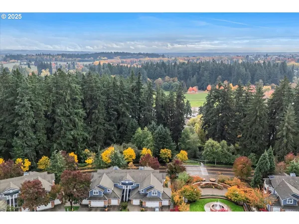 an aerial view of residential building and parking space