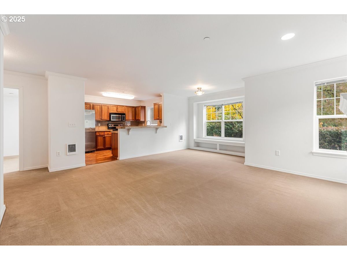 30424 Southwest Ruth Street, Unit 84 Wilsonville, OR 97070 - Photo 6 of 48 a view of livingroom with furniture and window