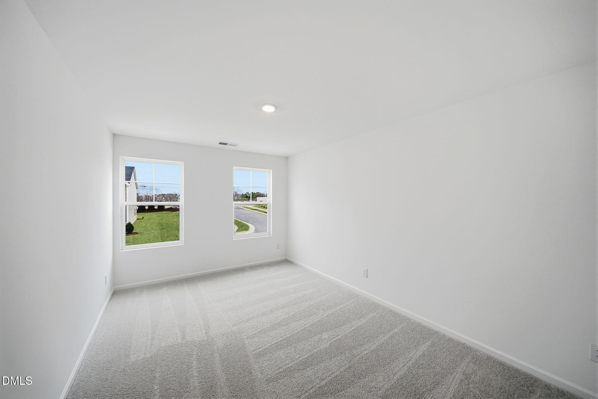 2946 Hickory Fld Drive Raleigh, NC 27616 - Photo 15 of 30 a view of an empty room with a window