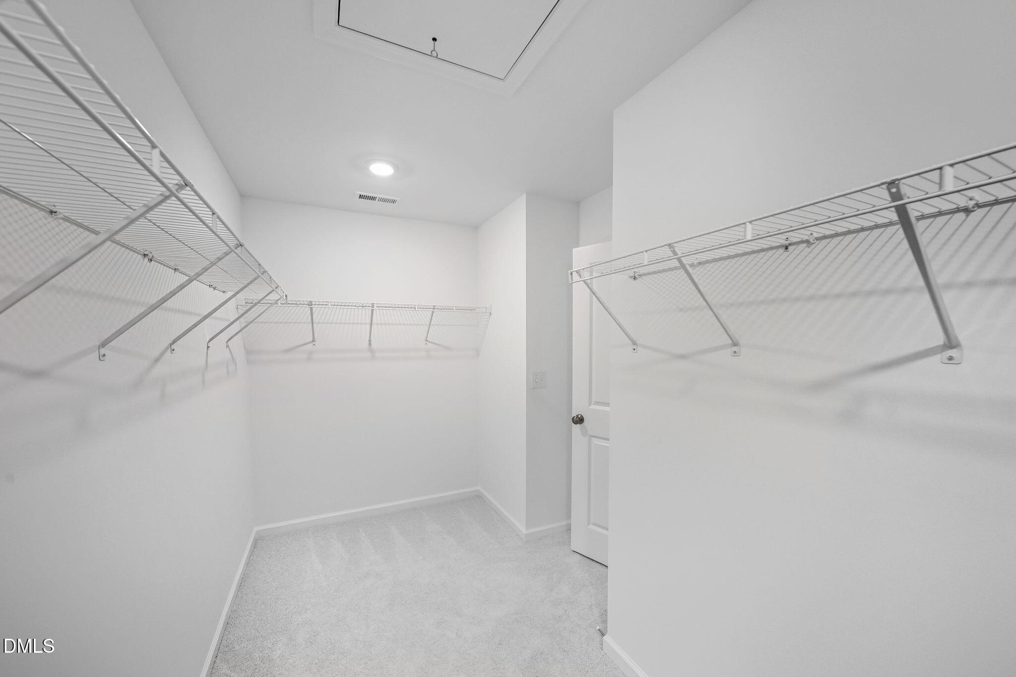 2946 Hickory Fld Drive Raleigh, NC 27616 - Photo 26 of 30 a view of a room with racks on the wall