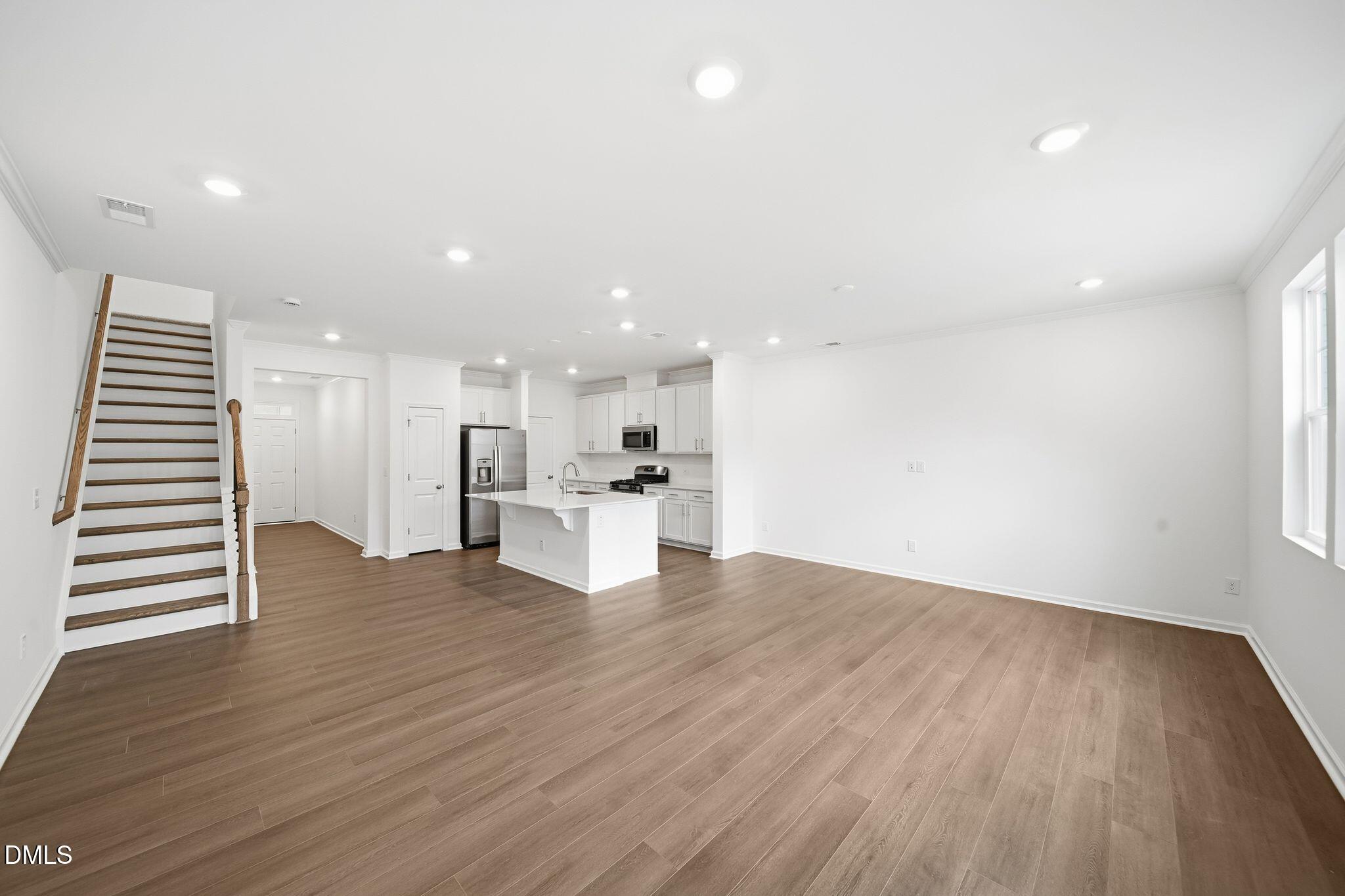 2946 Hickory Fld Drive Raleigh, NC 27616 - Photo 6 of 30 a view of kitchen living space with wooden floor
