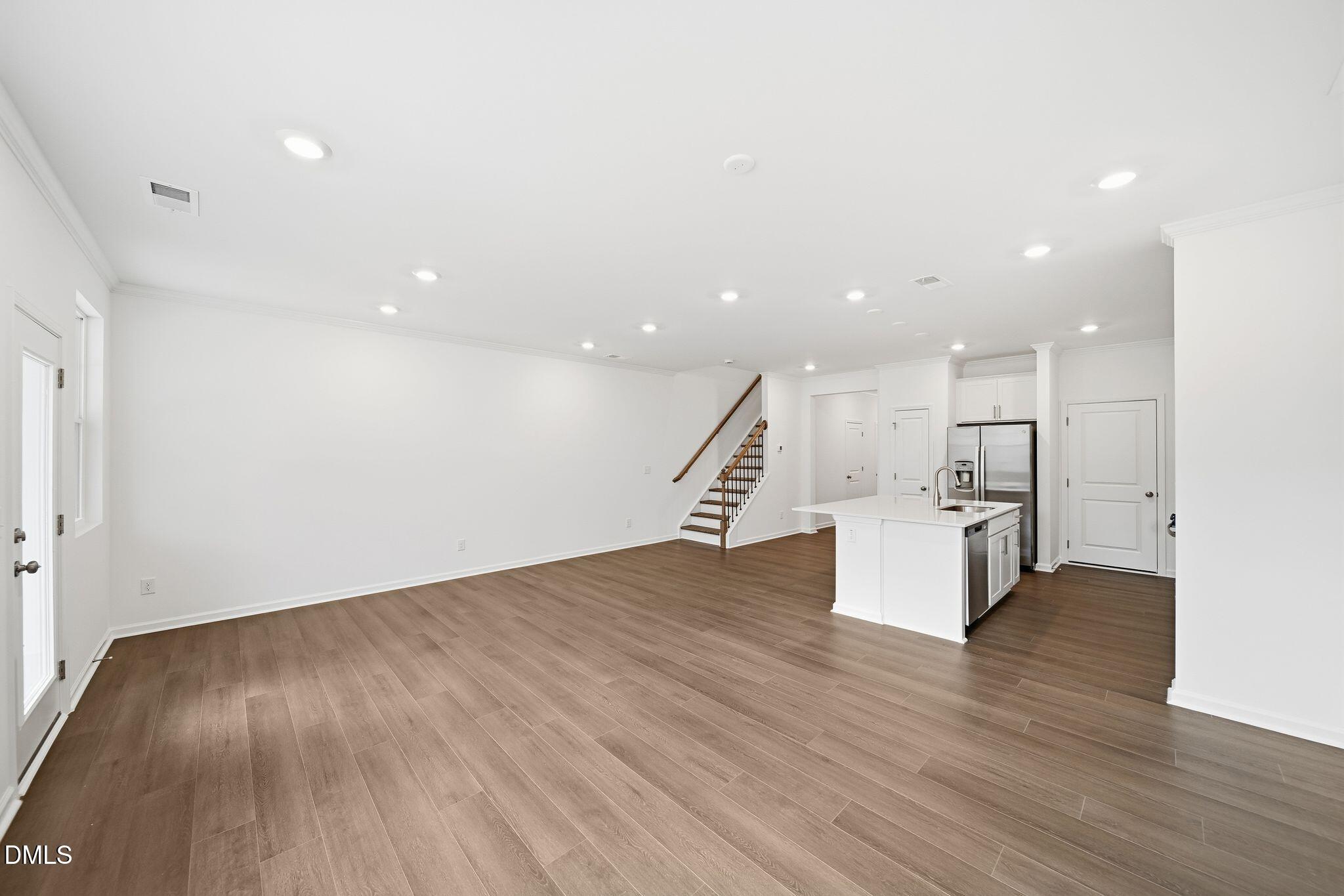 2946 Hickory Fld Drive Raleigh, NC 27616 - Photo 7 of 30 a view of kitchen and hall with wooden floor