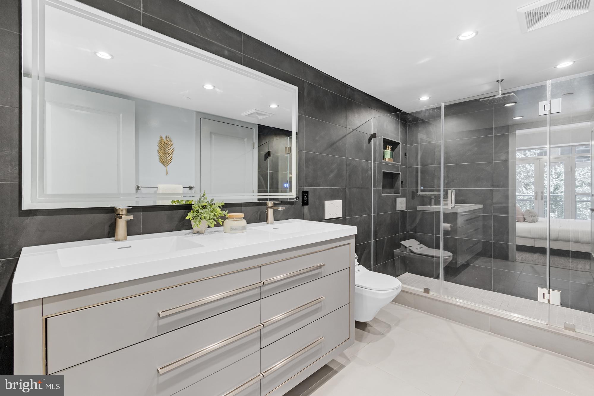 1025 First Street Southeast, Unit 311 Washington, DC 20003 - Photo 18 of 39 Primary dual vanity bath