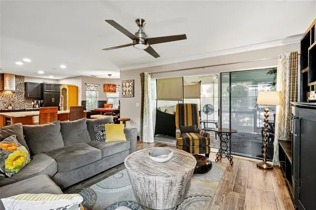 a living room with furniture and a table