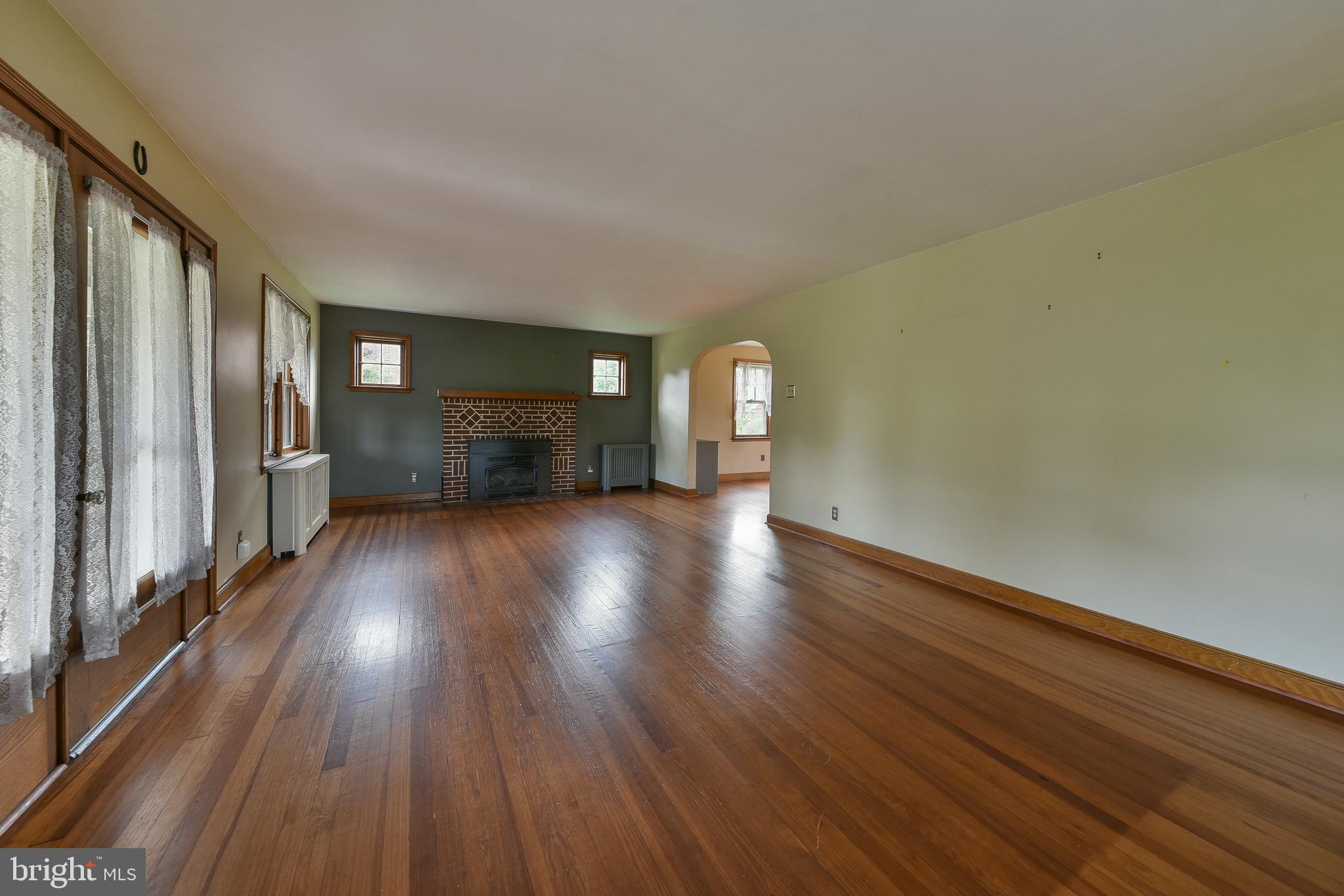 53 West Reliance Road Souderton, PA 18964 - Photo 5 of 24 Family Room and fireplace
