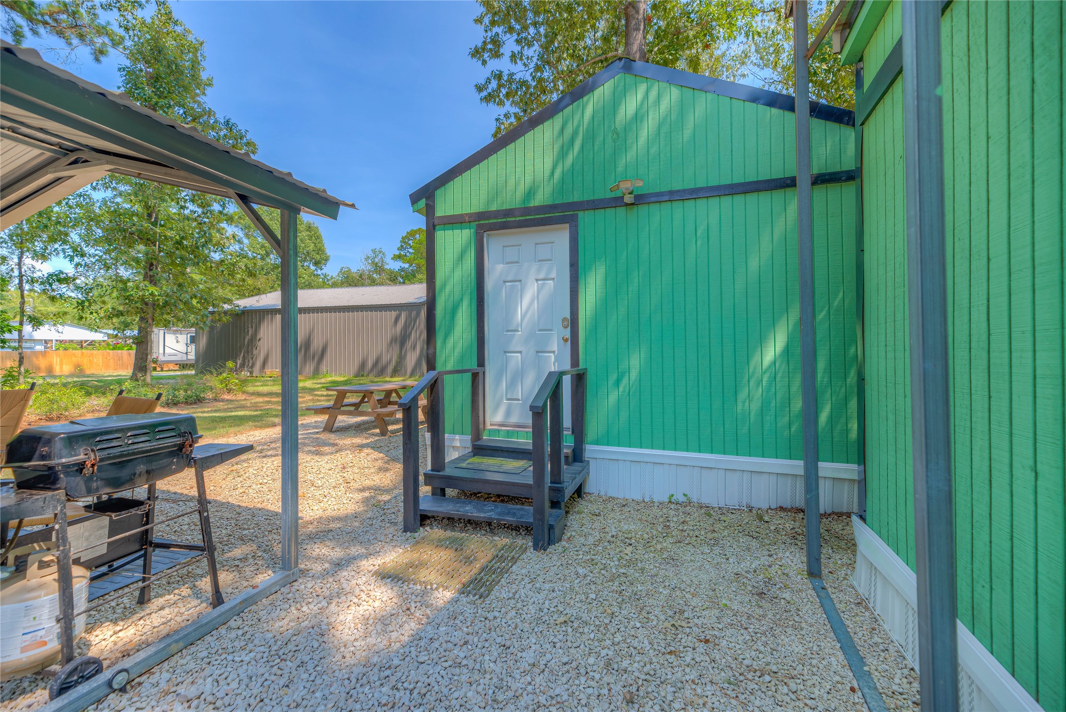 191 Trinidad Lane Point Blank, TX 77364 - Photo 15 of 29 14 X 14 STORAGE BUILDING, WORKSHOP AND UTILITY ROOM
