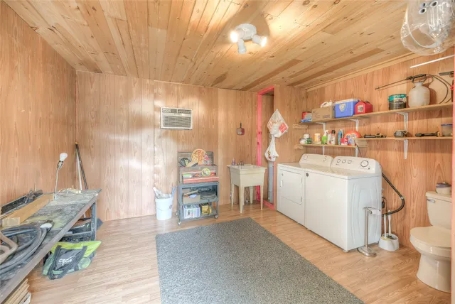 a view of a porch with furniture and a yard