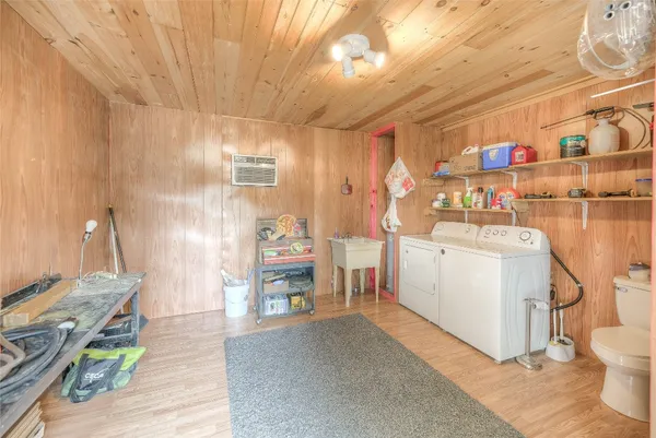 a utility room with cabinets
