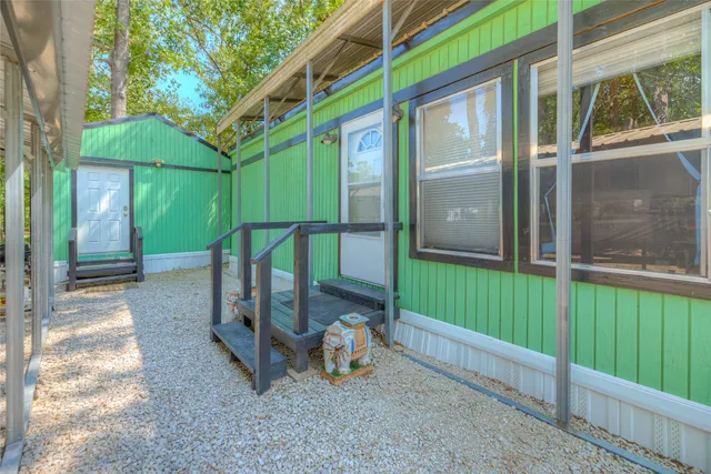 a house view with a backyard space