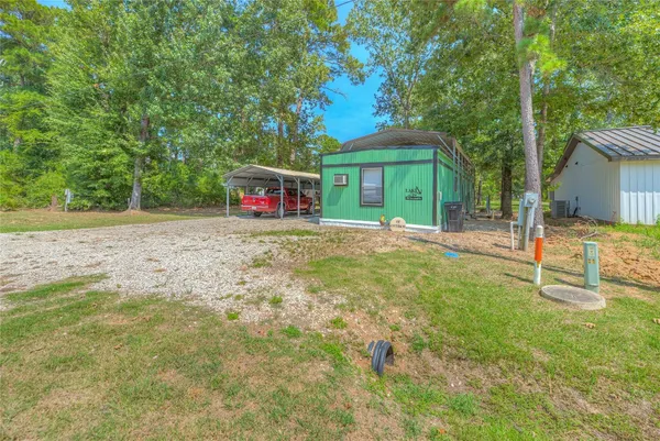 a house view with a backyard space