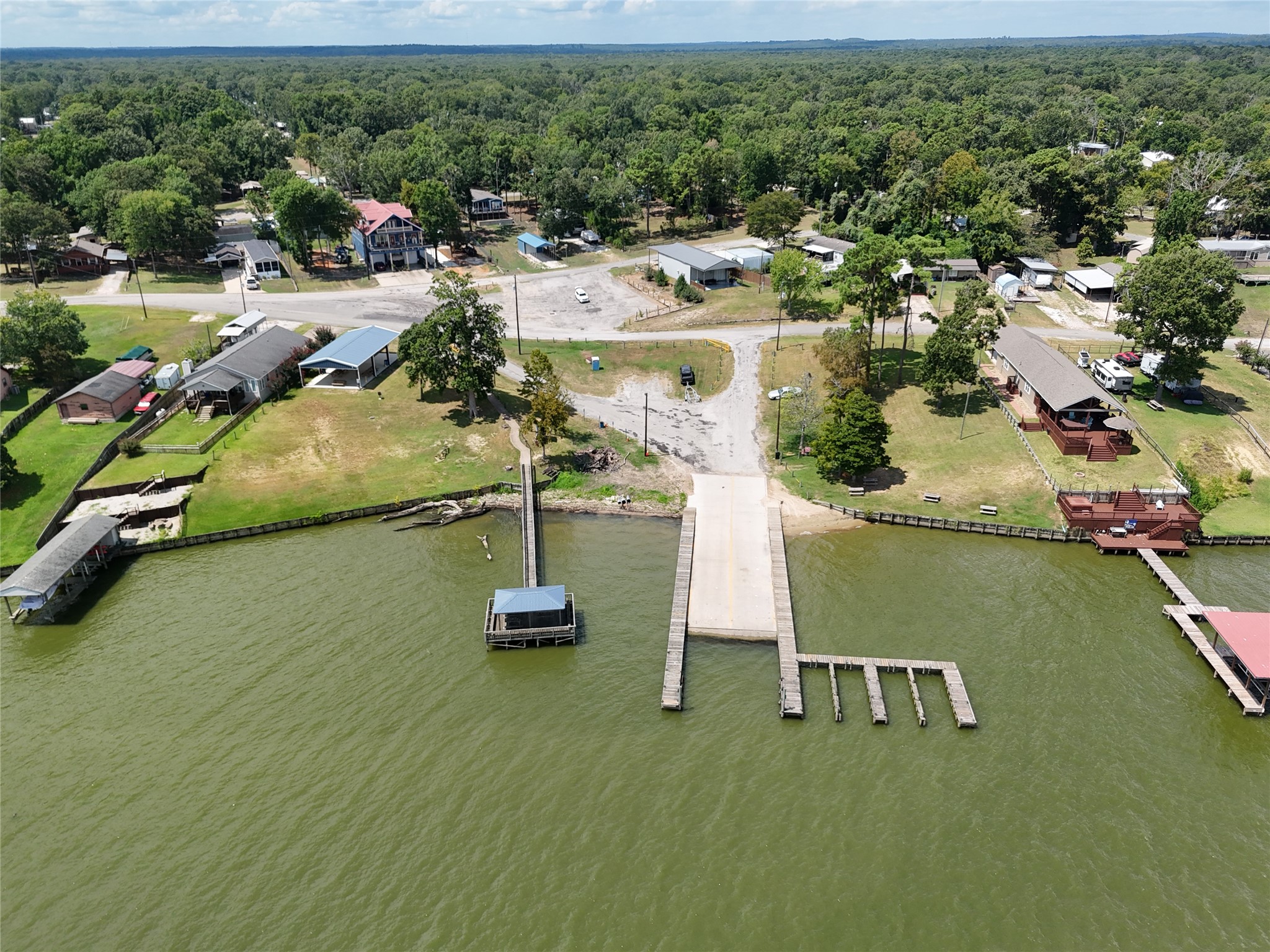 191 Trinidad Lane Point Blank, TX 77364 - Photo 3 of 29 SUBDIVISION BOAT RAMP AND FISHING PEIR
