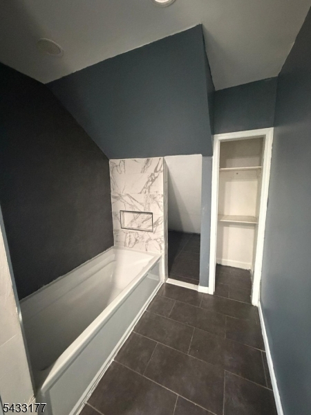 166 Renner Avenue, Unit 3 Newark, NJ 07112 - Photo 16 of 24 a view of an empty room with a window