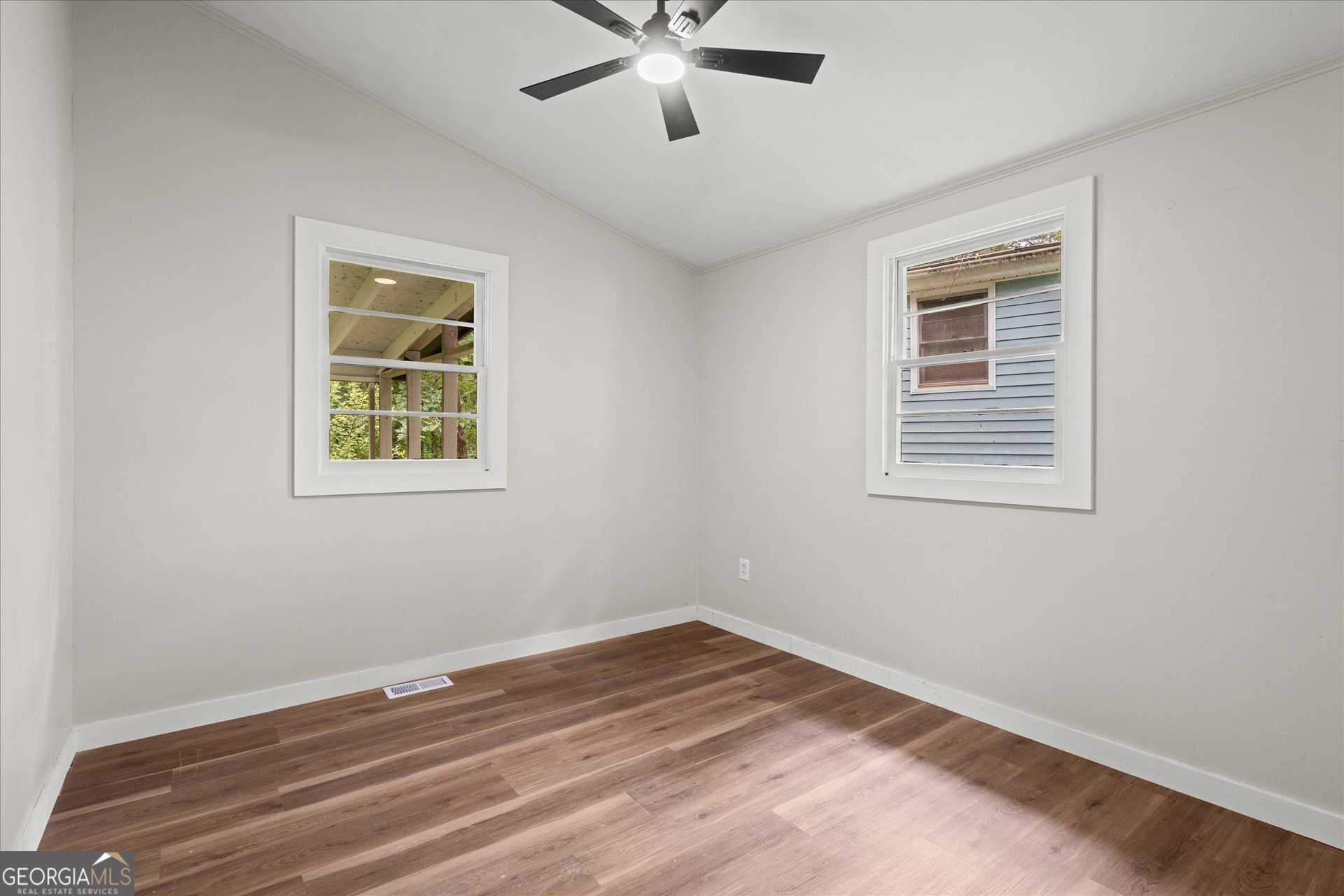 3102 McKenzie Road East Point, GA 30344 - Photo 18 of 31 a view of room with window and ceiling fan