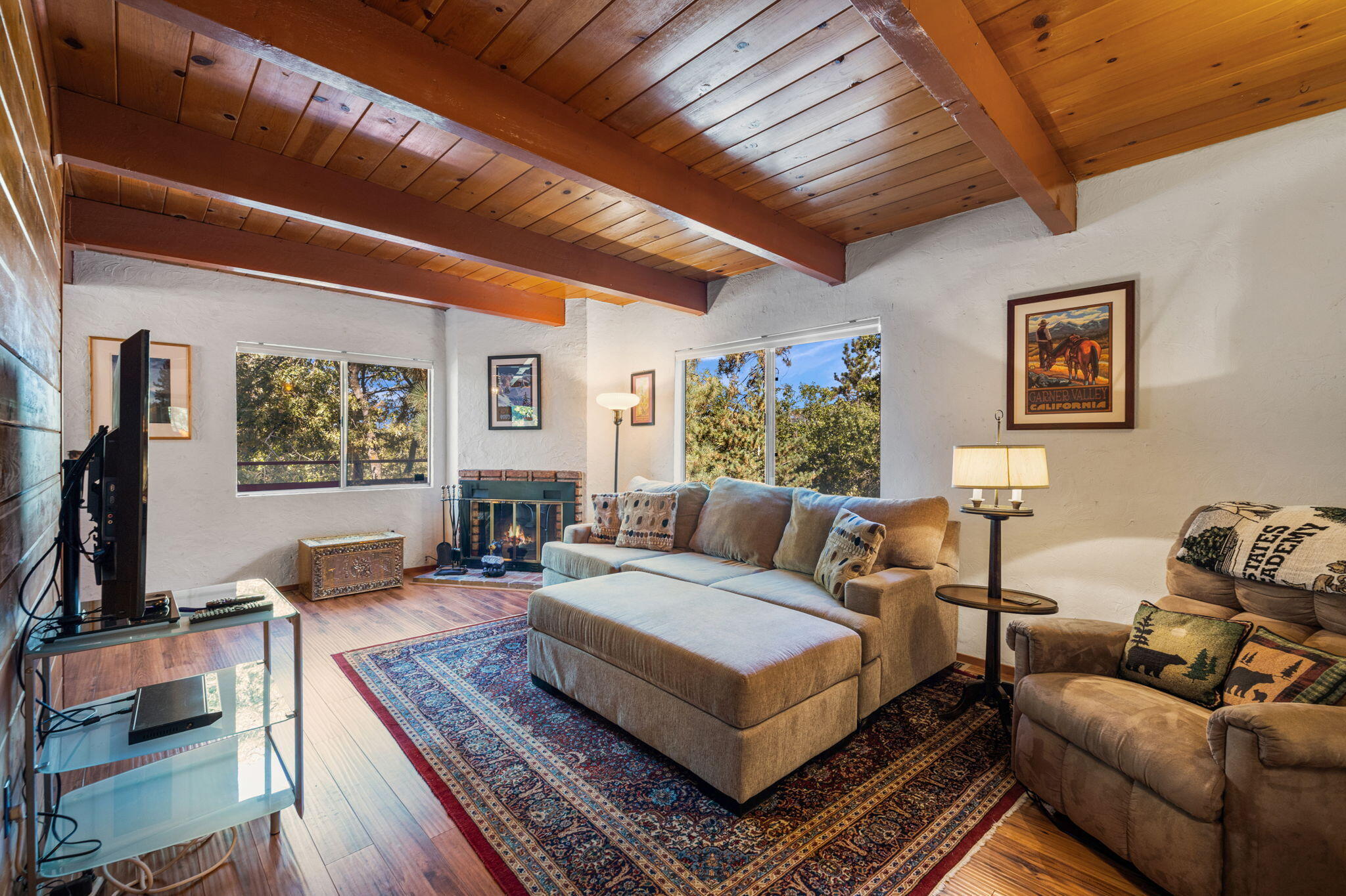 54370 Valley-View Idyllwild, CA 92549 - Photo 11 of 35 a living room with furniture a rug and a large window