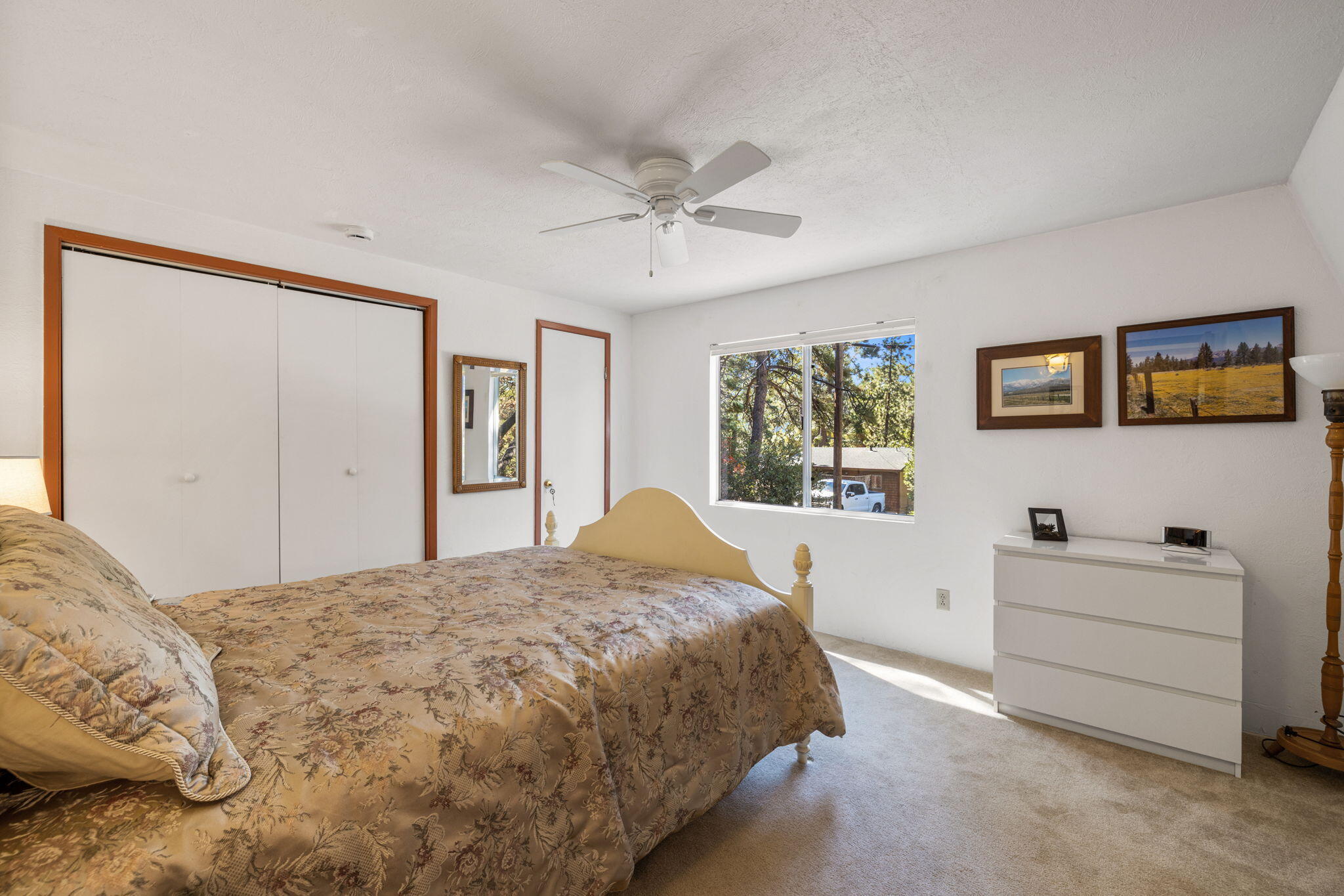 54370 Valley-View Idyllwild, CA 92549 - Photo 16 of 35 a bed room with a bed and a window