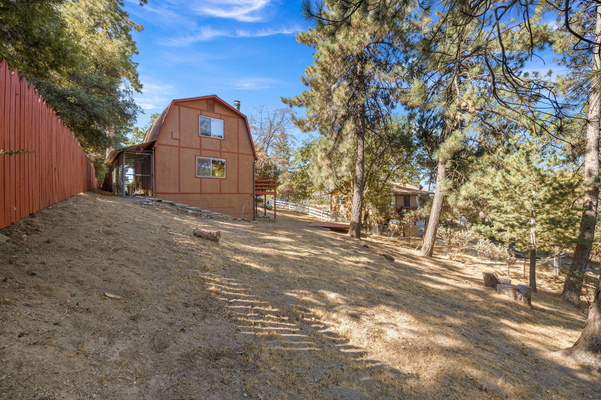 54370 Valley-View Idyllwild, CA 92549 - Photo 28 of 35 a view of a wooden house with a large tree