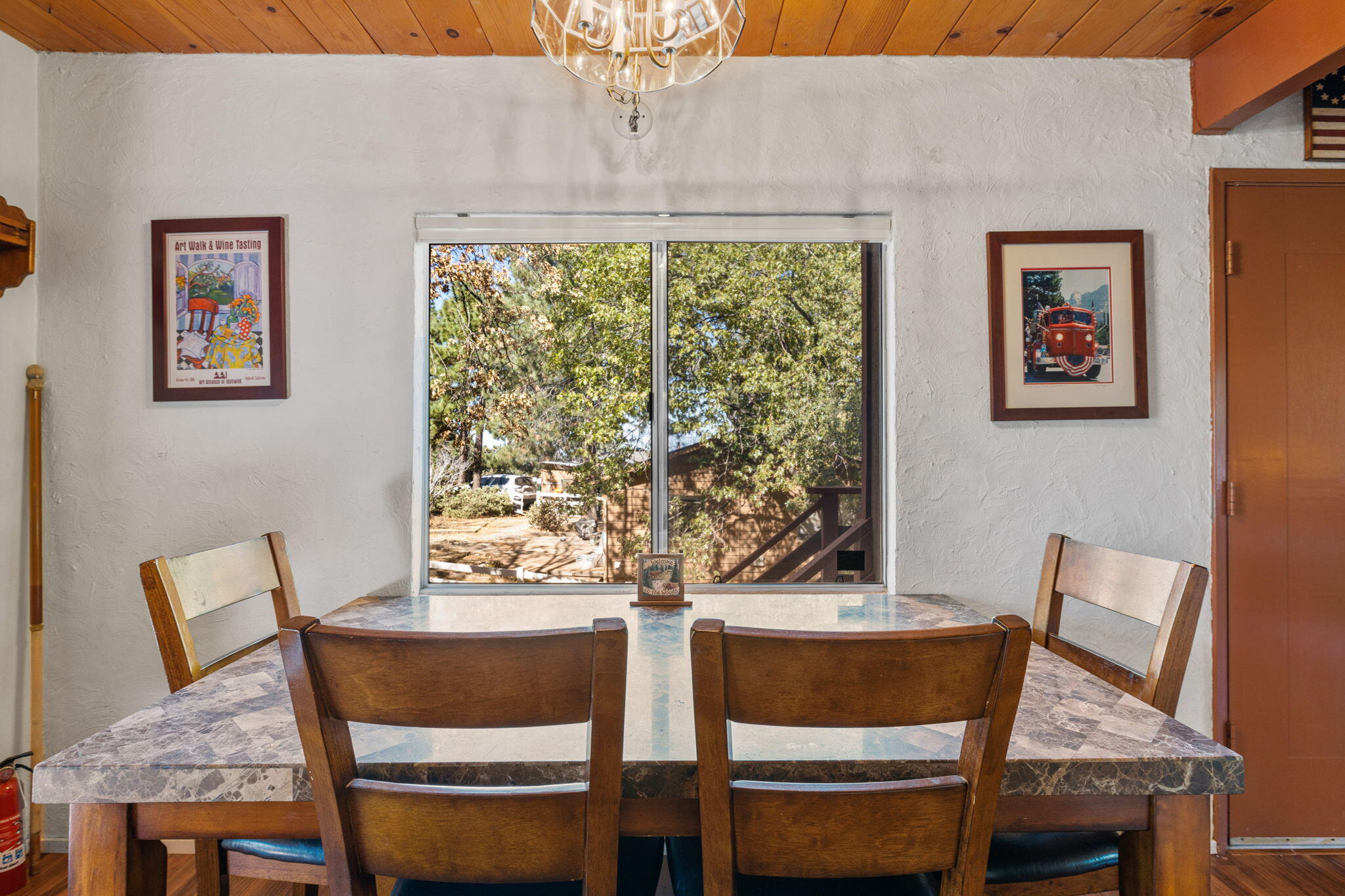 54370 Valley-View Idyllwild, CA 92549 - Photo 5 of 35 a view of a dining room with furniture and window