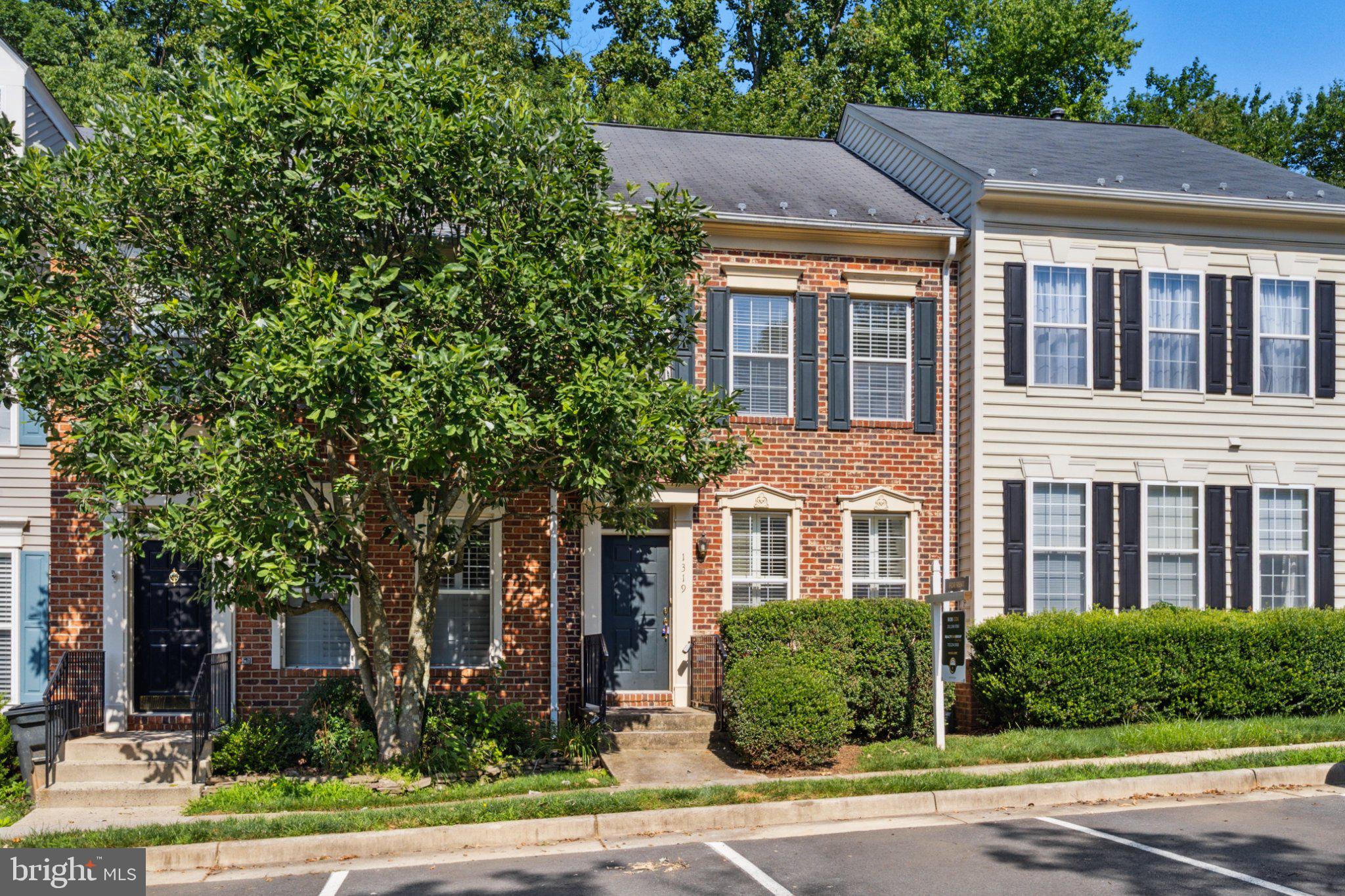 1319 Vintage Place Reston, VA 20194 - Photo 1 of 37 Charming brick-front townhome awaits!