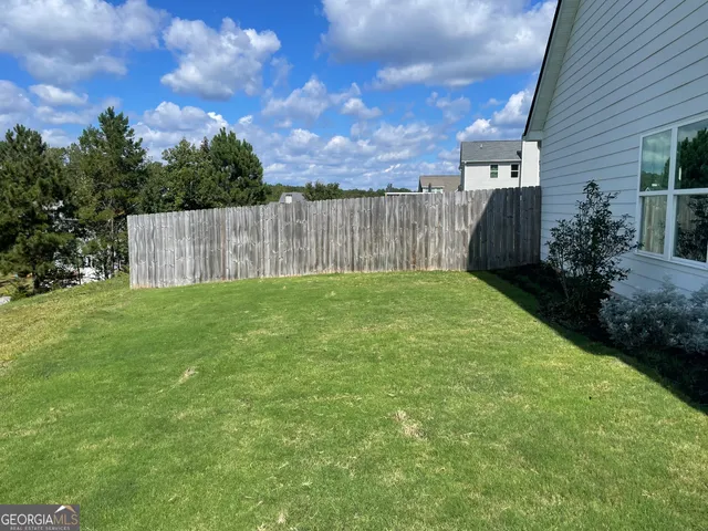 a view of a garden with an trees