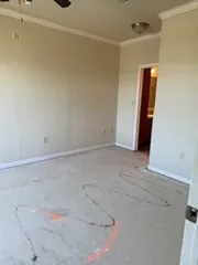 a bathroom with a mirror and a sink