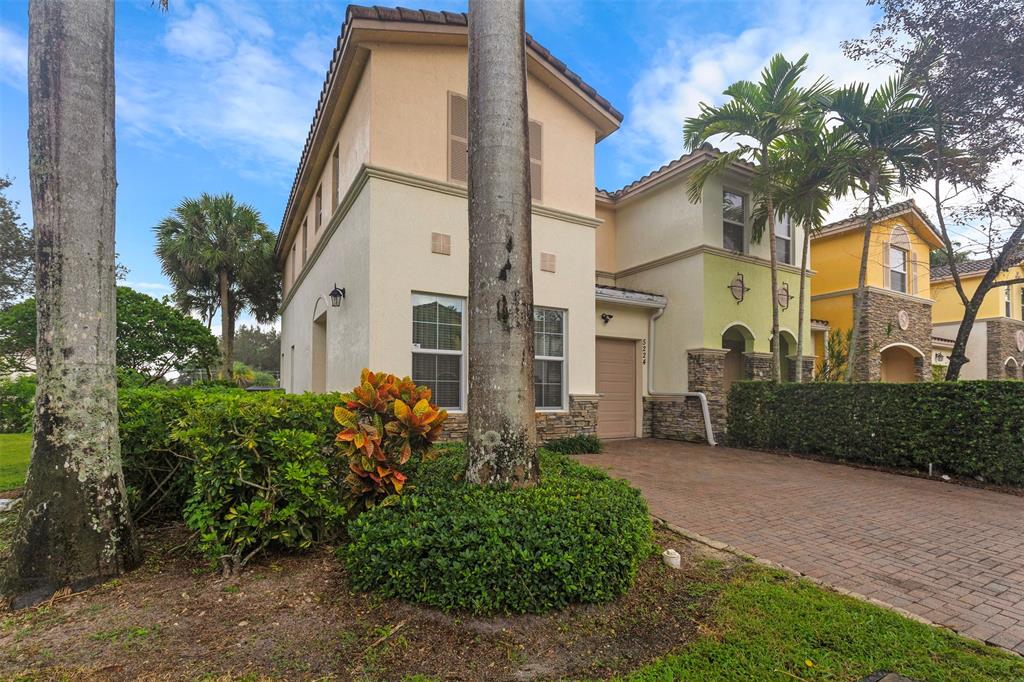 5224 Southwest 77th Way Davie, FL 33328 - Photo 12 of 43 a house that has a tree in front of the house