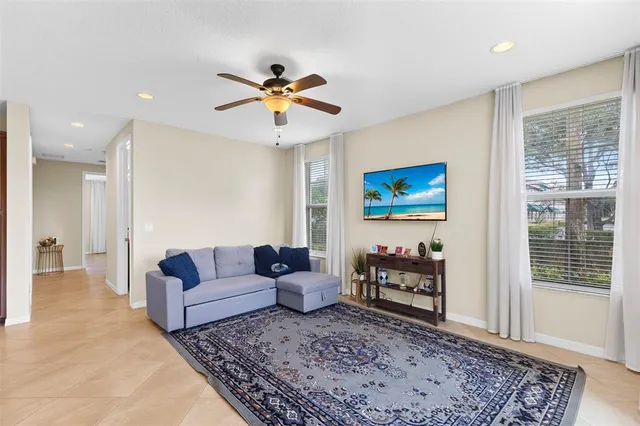 a living room with furniture and a rug