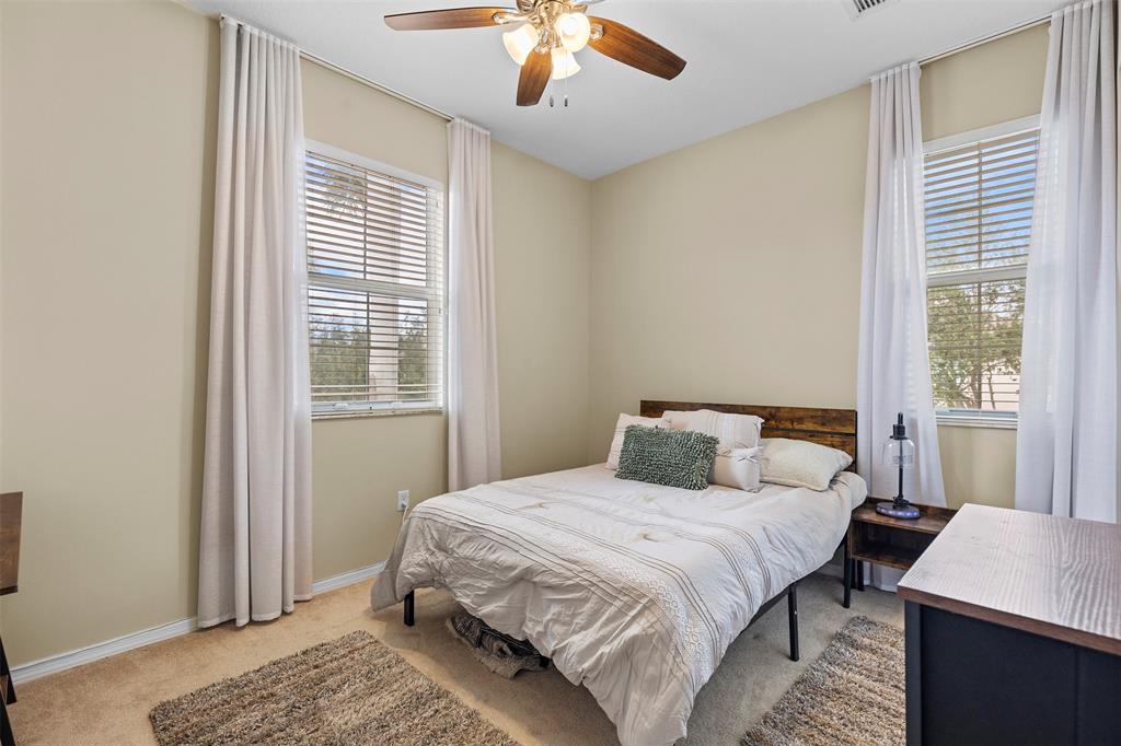 5224 Southwest 77th Way Davie, FL 33328 - Photo 19 of 43 a bedroom with a bed and a window