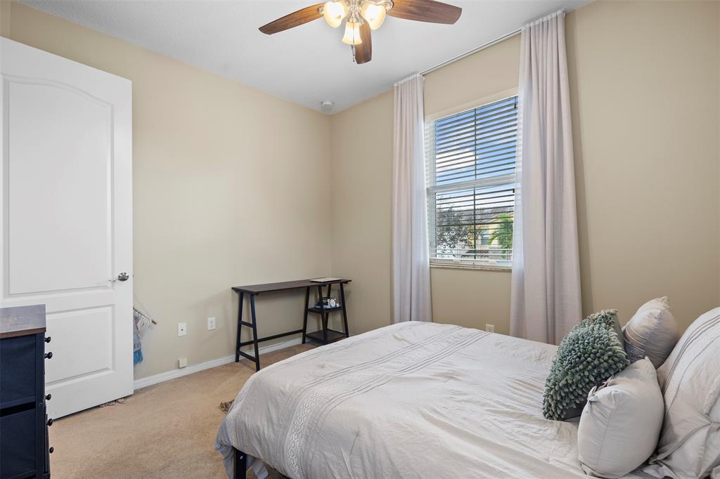 5224 Southwest 77th Way Davie, FL 33328 - Photo 20 of 43 a bedroom with a bed and a window