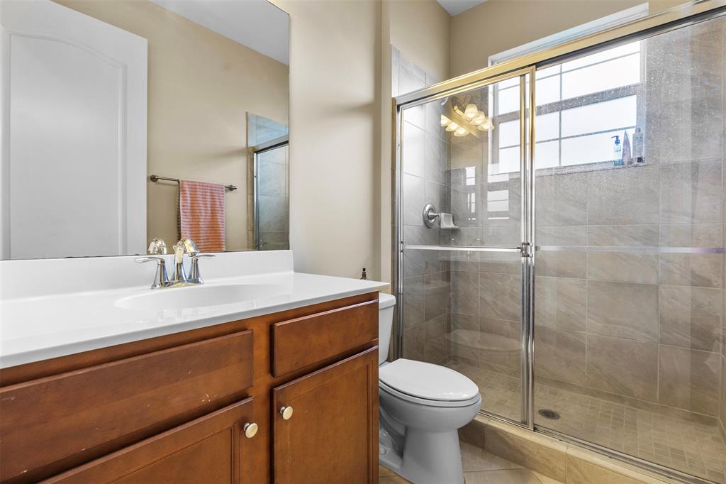 5224 Southwest 77th Way Davie, FL 33328 - Photo 24 of 43 a bathroom with a sink a toilet and shower