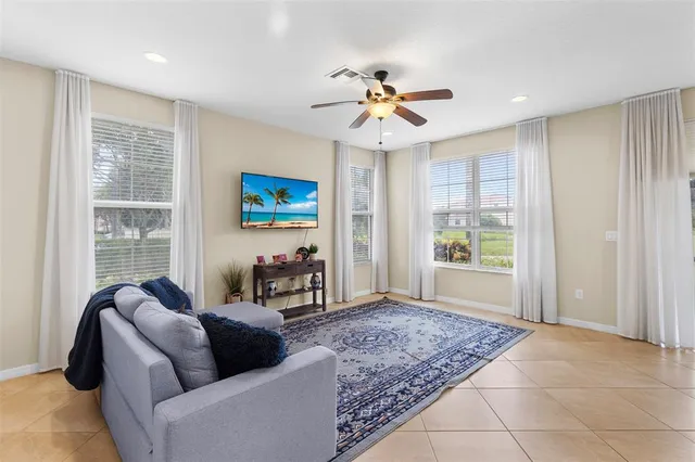 a living room with furniture and a window