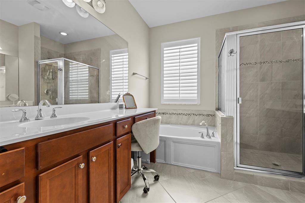 5224 Southwest 77th Way Davie, FL 33328 - Photo 42 of 43 a bathroom with a tub sink and mirror