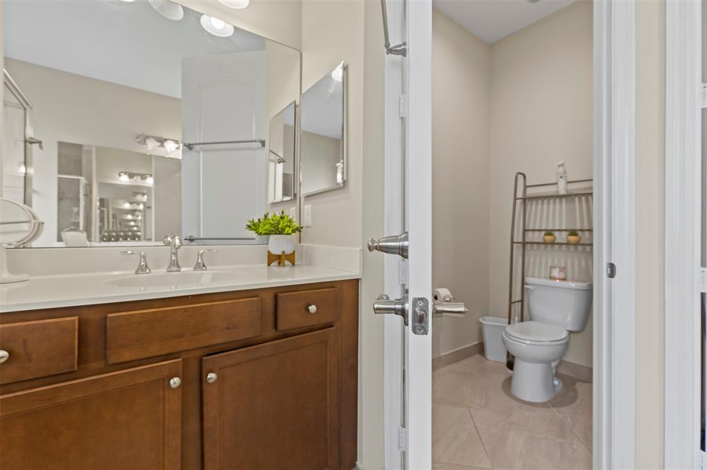 5224 Southwest 77th Way Davie, FL 33328 - Photo 43 of 43 a bathroom with a sink toilet and a mirror