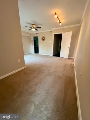 a view of a livingroom with a ceiling fan