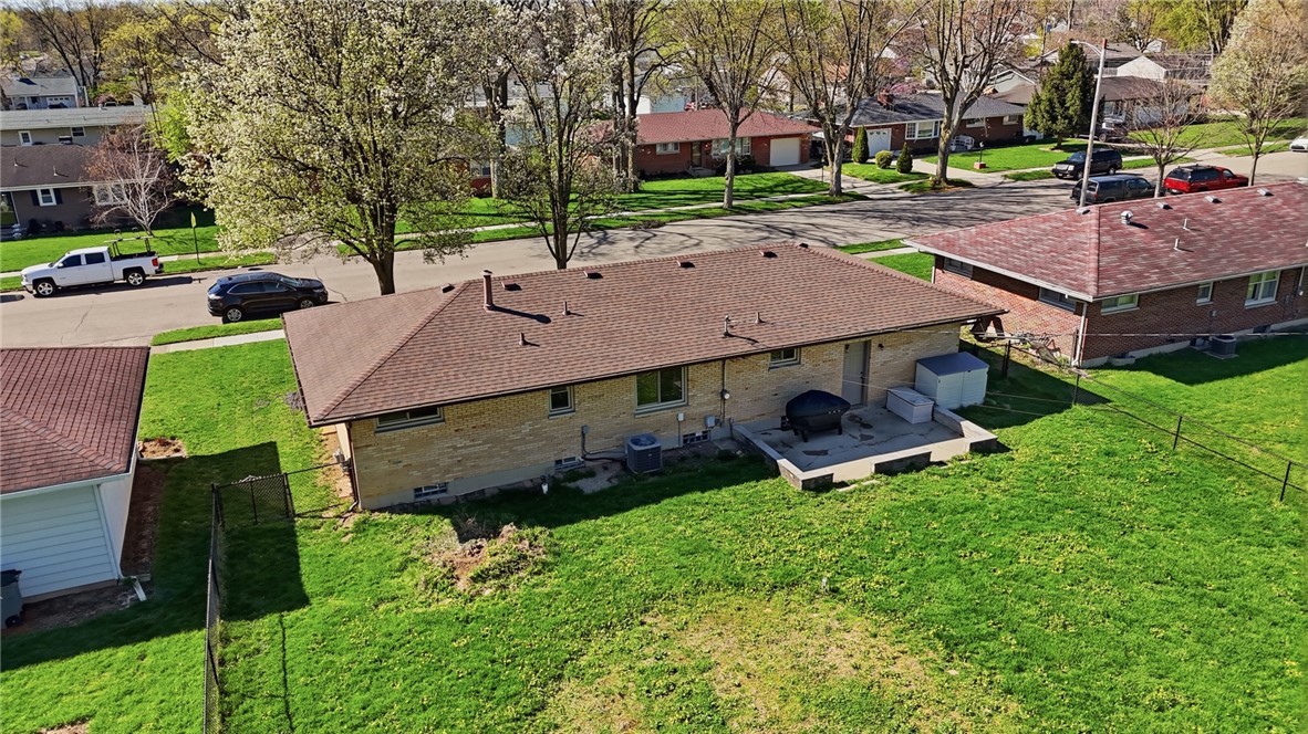 1325 Chelsea Road Troy, OH 45373 - Photo 3 of 42 An aerial view showcases a residential property featuring a well-maintained lawn and sturdy roofing.