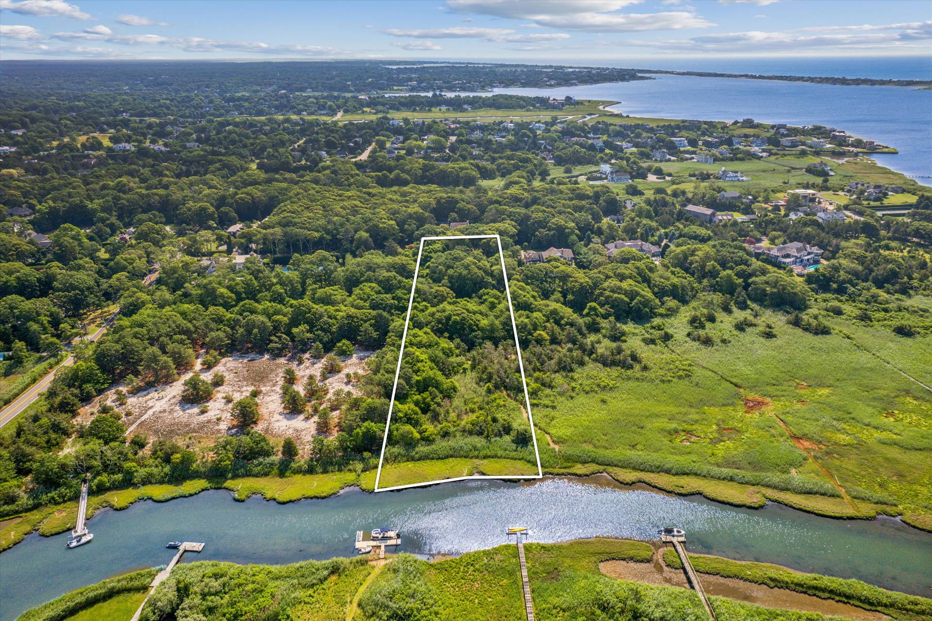 27 Jagger Lane Westhampton, NY 11977 - Photo 12 of 12 an aerial view of residential houses with outdoor space