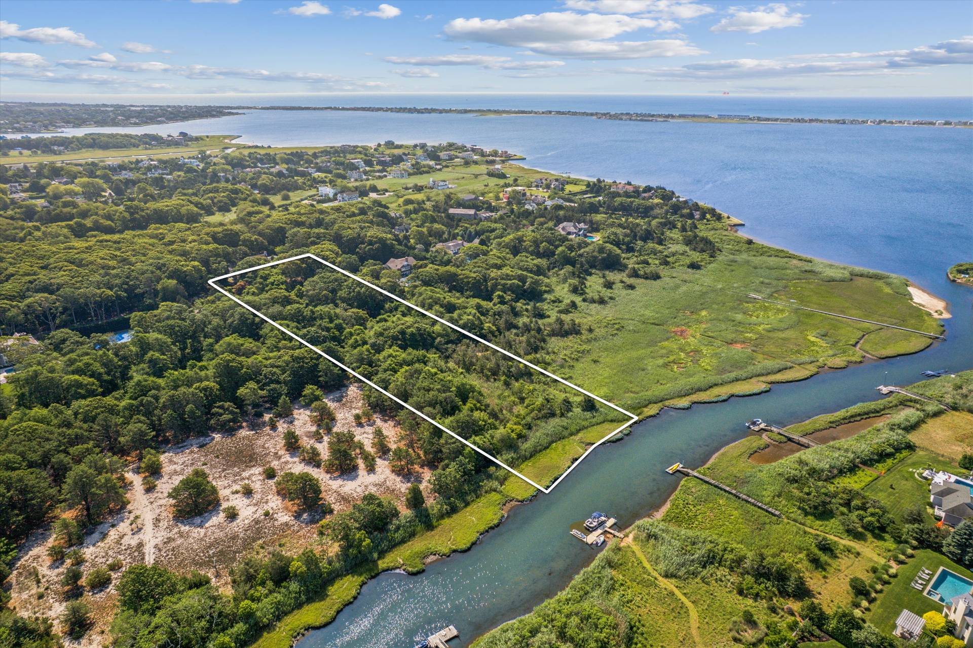 27 Jagger Lane Westhampton, NY 11977 - Photo 3 of 12 a view of a tennis court